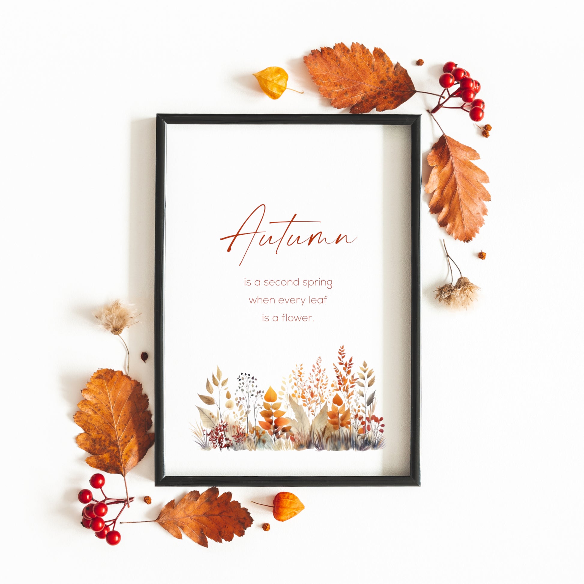 Single portrait print of Albert Camus quote: Autumn is a second spring when every leaf is a flower. The word Autumn is prominent in a modern script font. Other text is in a small, sans serif font. An illustration of autumn foliage is below the text.