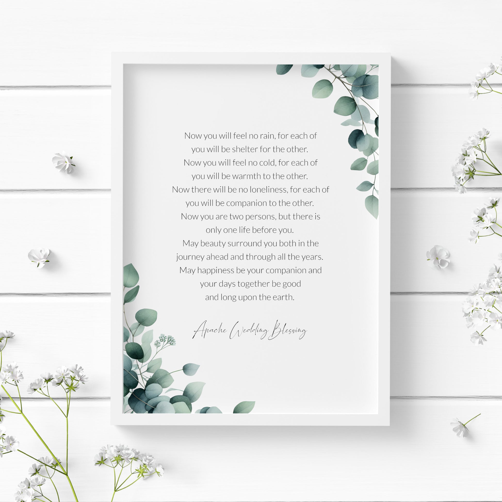 Single portrait print featuring an Apache Wedding Blessing. The text is centred, with an illustration of eucaluptus leaves embellishing the top right and bottom left corners. Styling is modern and elegant.