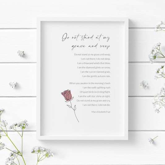 Single portrait print of the poem Do Not Stand At My Grave And Weep by Mary Elizabeth Frye. Title is in an elegant script font with body copy in a crisp sans serif font. Text is black on a white background. A single rose is bottom left of the poem.