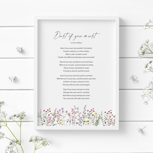 Single portrait typography print featuring the poem Dust If You Must by Rose Milligan. The title is in an elegant script font, with the body text in a crisp sans serif font. Text is black on a white background. The print is finished with a lower border of brightly coloured wildflowers.