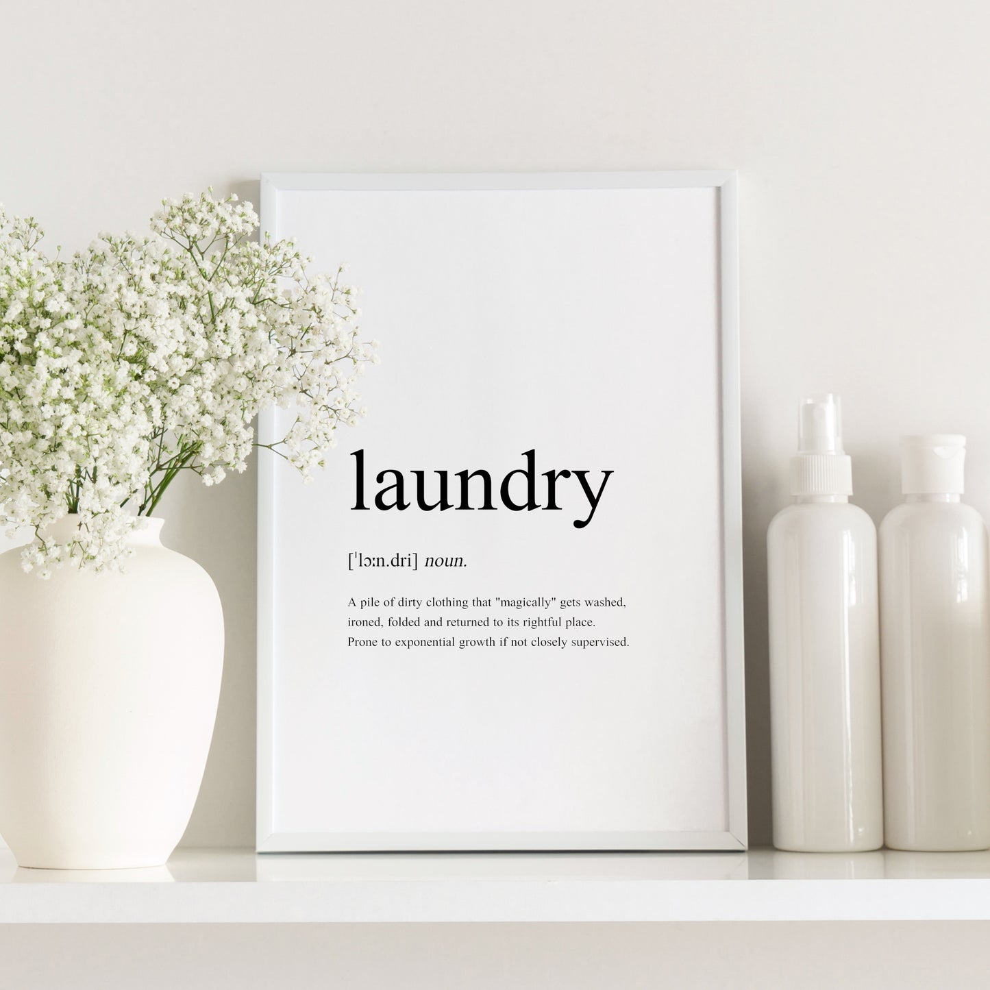 Single portrait typography print featuring a funny dictionary-style definition of the word laundry. Text is black on a white background.