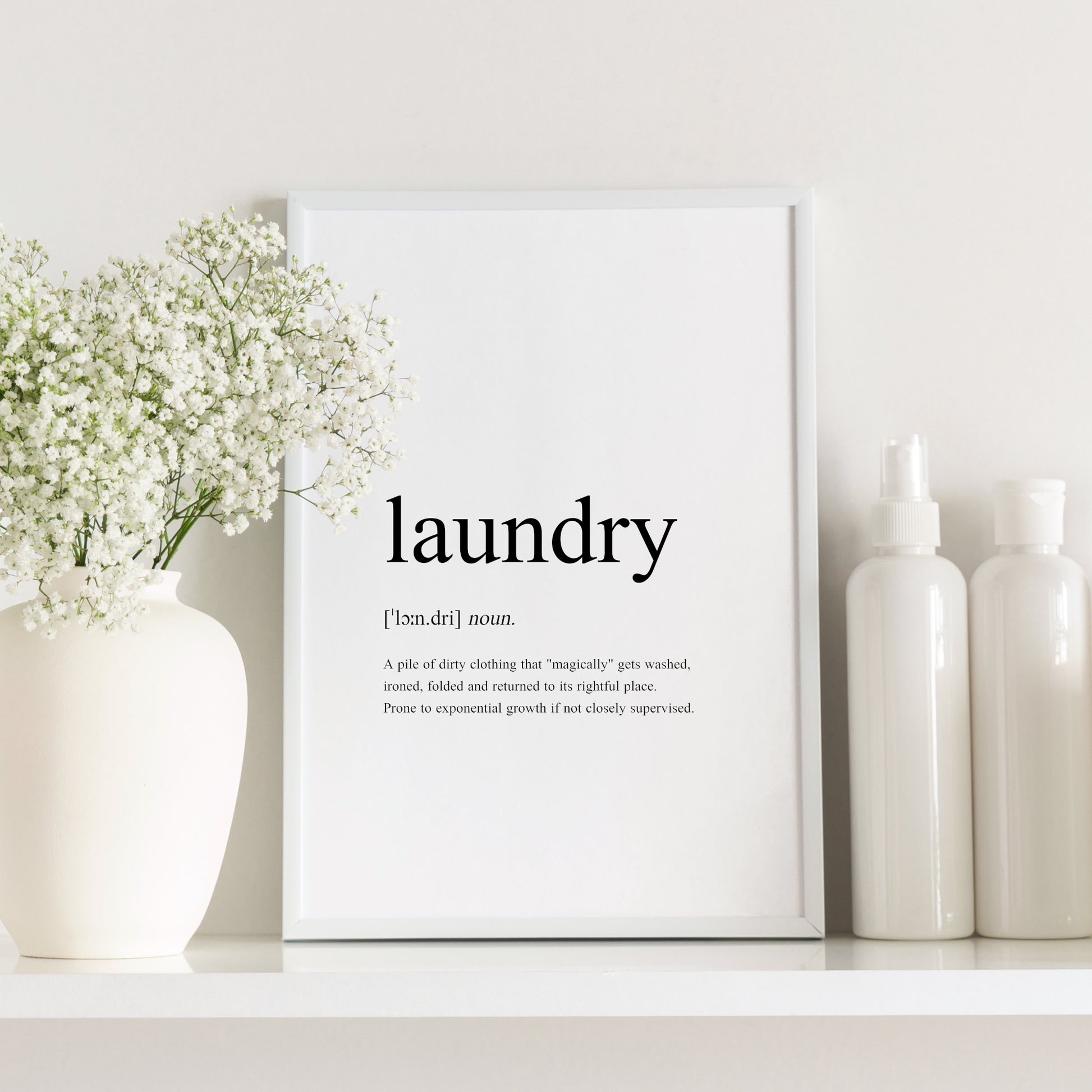 Single portrait typography print featuring a funny dictionary-style definition of the word laundry. Text is black on a white background.