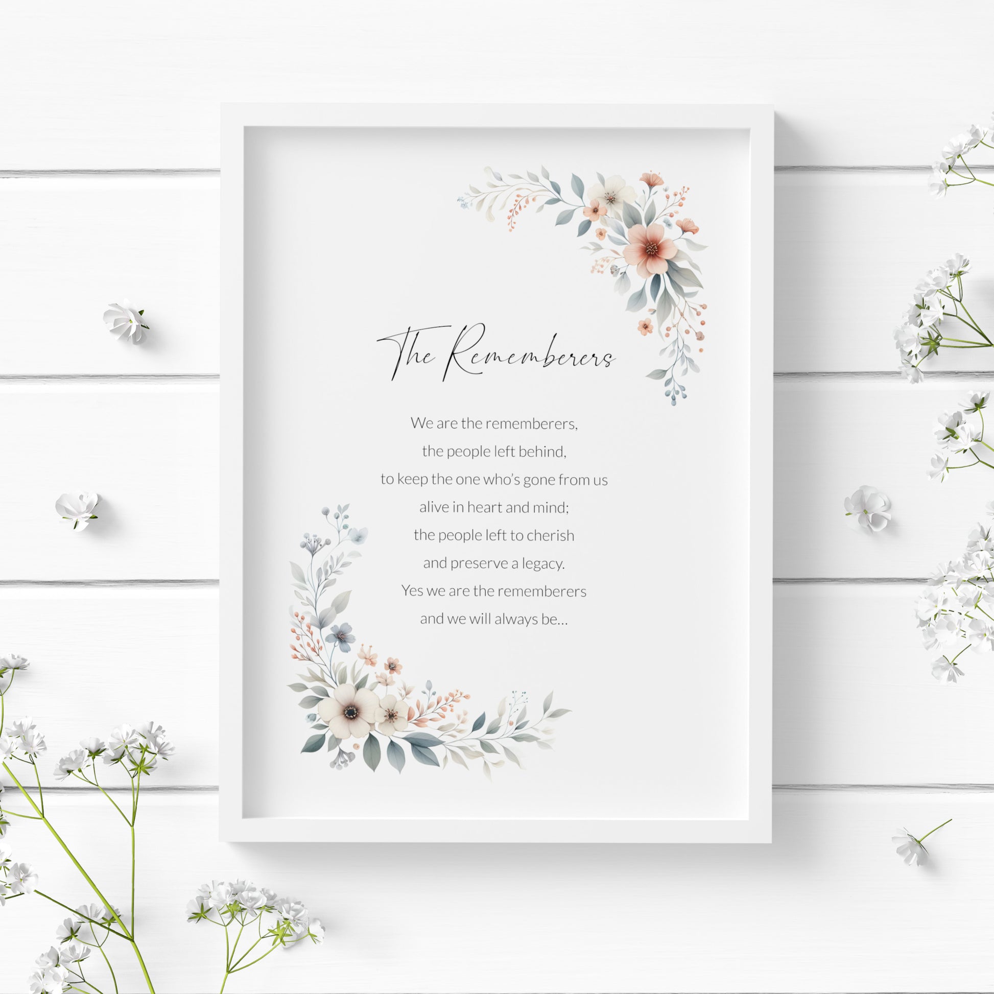 Single portrait print of the poem "The Remembers". The title is in a modern script font, with the body text is a crisp sans serif font. Text is black on awhite background. Delicate floral imagery frames the print top right and bottom left.