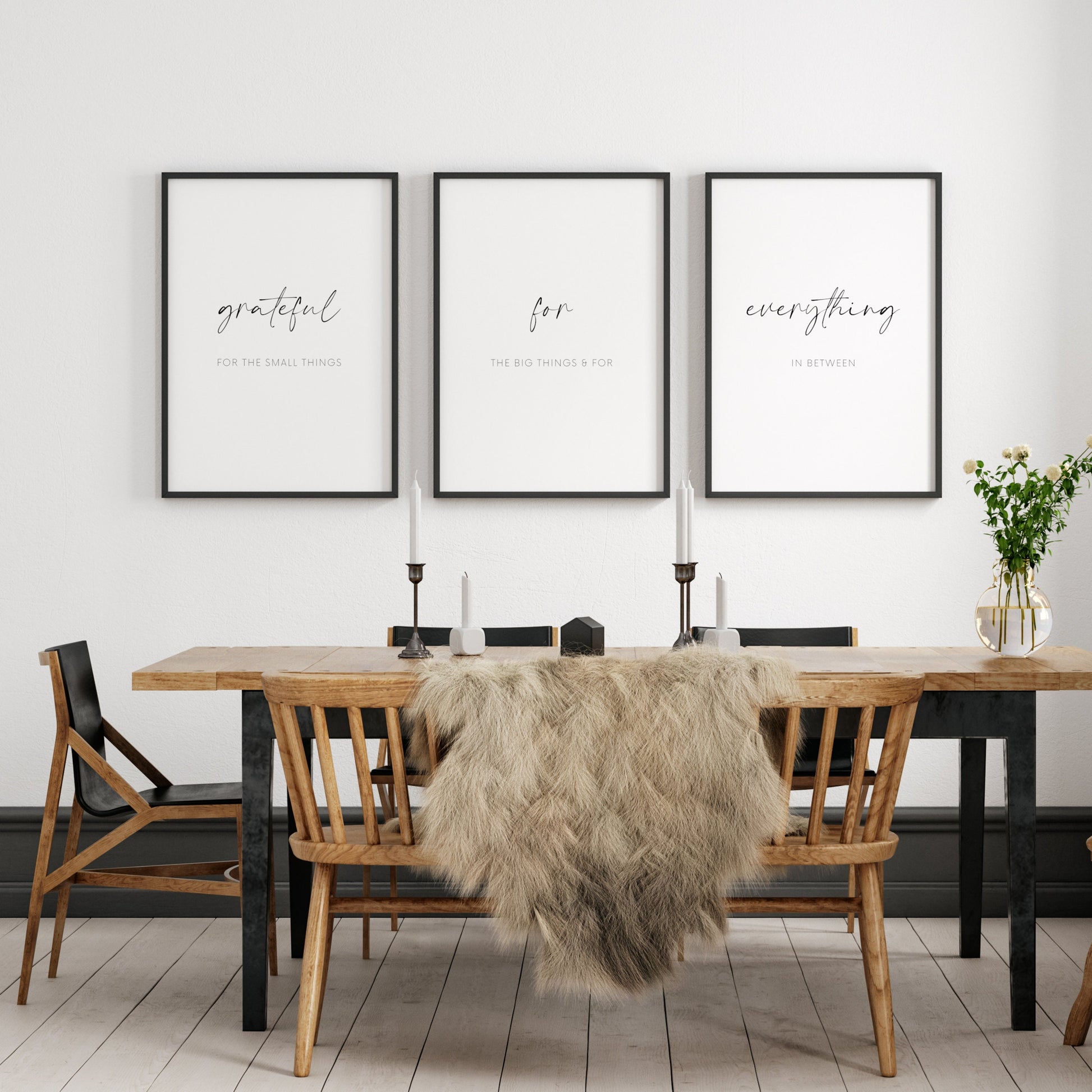 Set of 3 portrait typography prints shown in a dining room setting. Text across the 3 reads: grateful for the small things for the big things & for everything in between. The words grateful for everything are highlighted in an elegant script font.