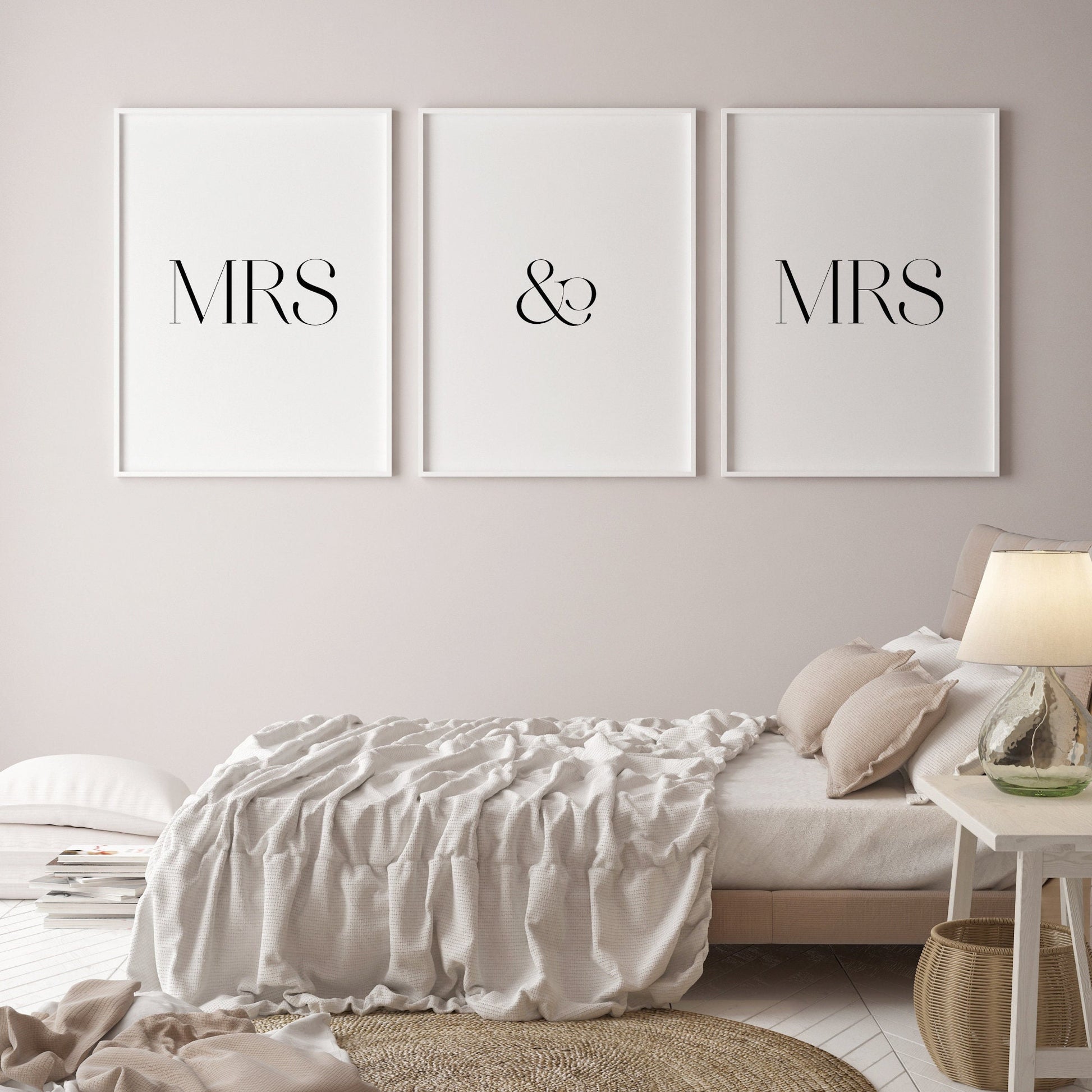 Set of 3 portrait typography prints reading "Mrs & Mrs", with one word per print. All text is in a large, formal. upper case serif font. Text is black on a white background.