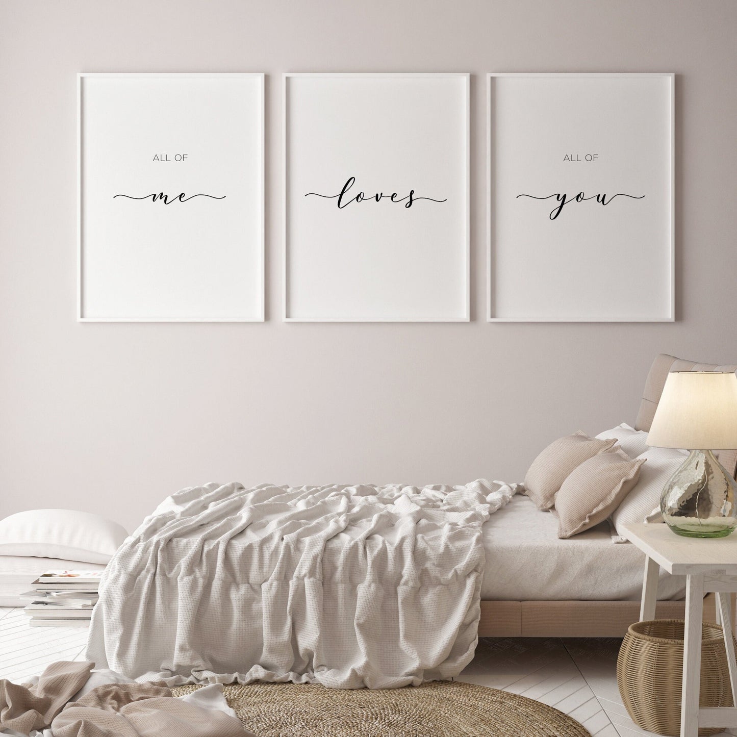 Set of 3 portrait typography prints. Quote across all 3 reads: All of me loves all of you. The words "me loves you" are highlighted in an elegant script font, so that phrase can be read on its own. Text is black on a white background.