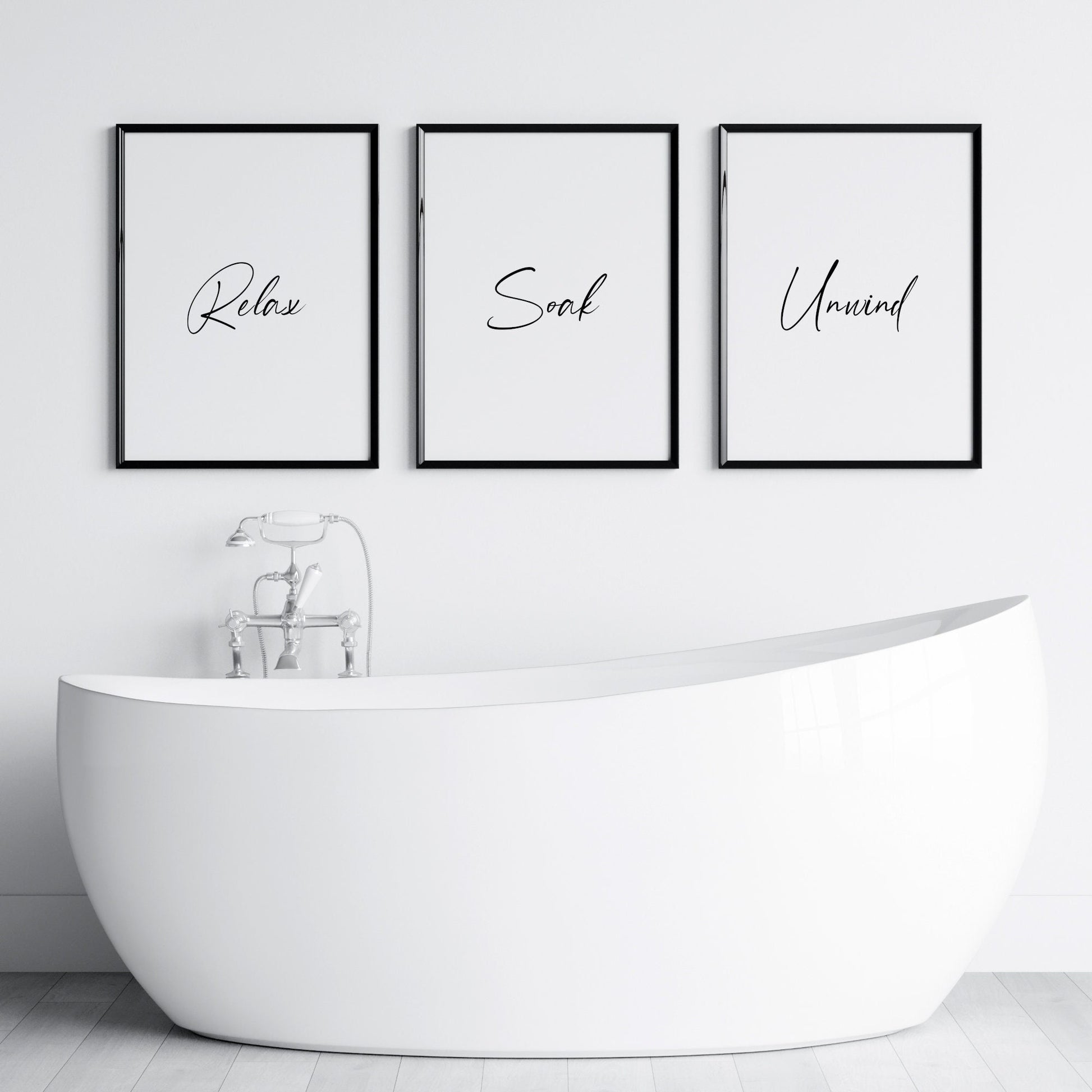 Set of 3 portrait typography prints for the bathroom. Quote across the 3 reads Relax Soak Unwind, with 1 word on each print. An elegant script font. The perfect gift for anyone who loves a bubble bath!