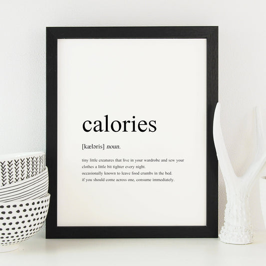 Single portrait typography print showing a humorous definition of the word calories in a traditional dictionary-style. Text is black on a white background.