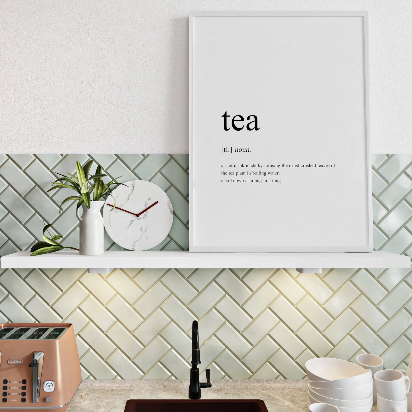 Single portrait typography print showing a humorous dictionary-style definition of the word &quot;tea&quot;. The print is shown framed in a kitchen setting, although it is sold unframed.