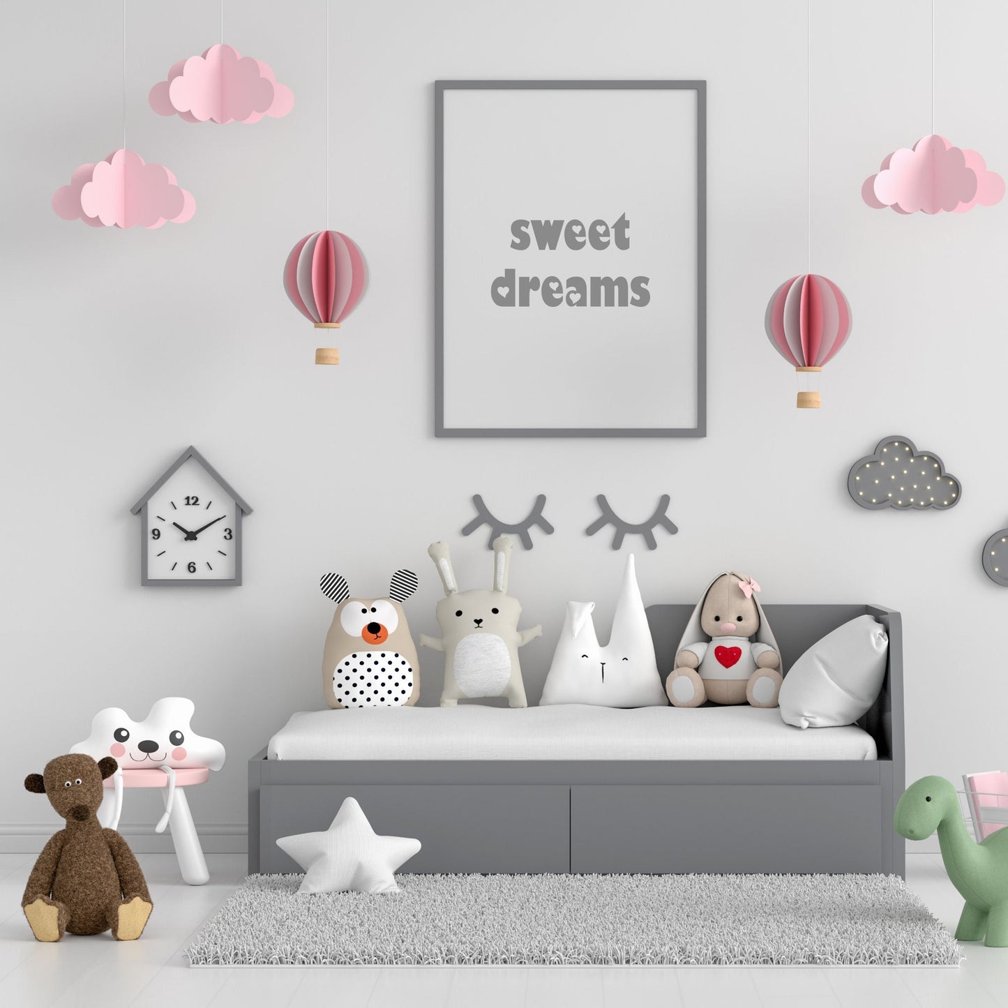 Single portrait print, with the words "Sweet Dreams". Text is grey on a white background and in a playful font, where the holes in letters have been replaced with hearts. The perfect accessory for your baby's nursery.