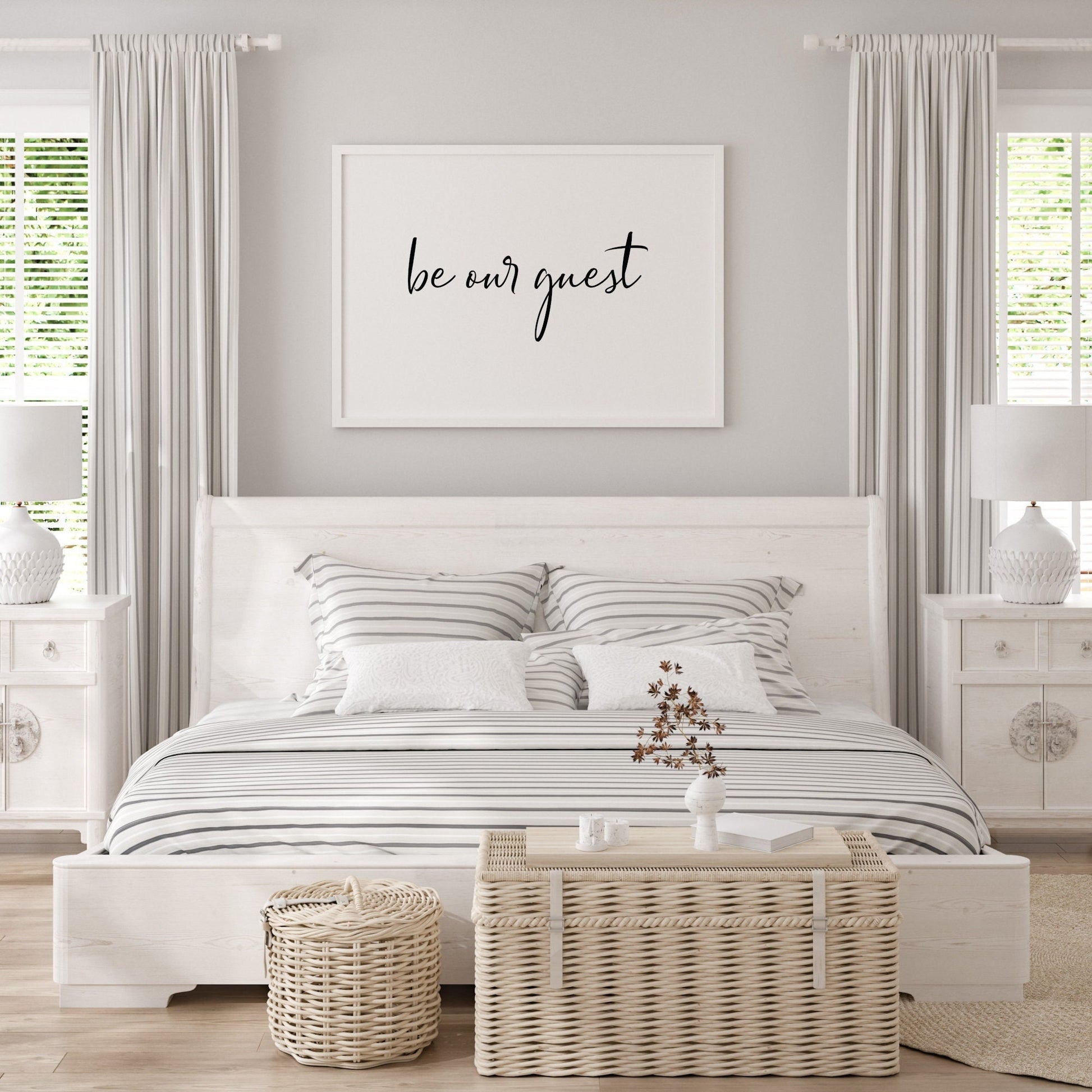 Single landscape typography print. Text reads: be our guest. All text is in a modern and stylish script font, black on a white background.