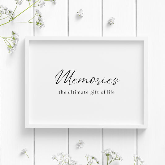 Single landscape typography print. Print reads: Memories... the ultimate gift of life. The word memories is positioned prominently in an elegant script font. Text is black on a white background.