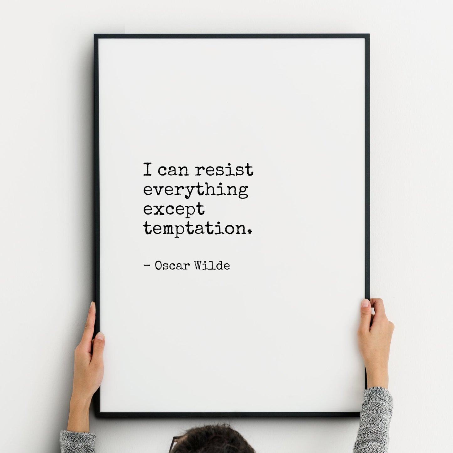 Single portrait typography print. Text reads "I can resist everything except temptation. - Oscar Wilde". A vintage typewriter-style font is used, with black text on a white background.